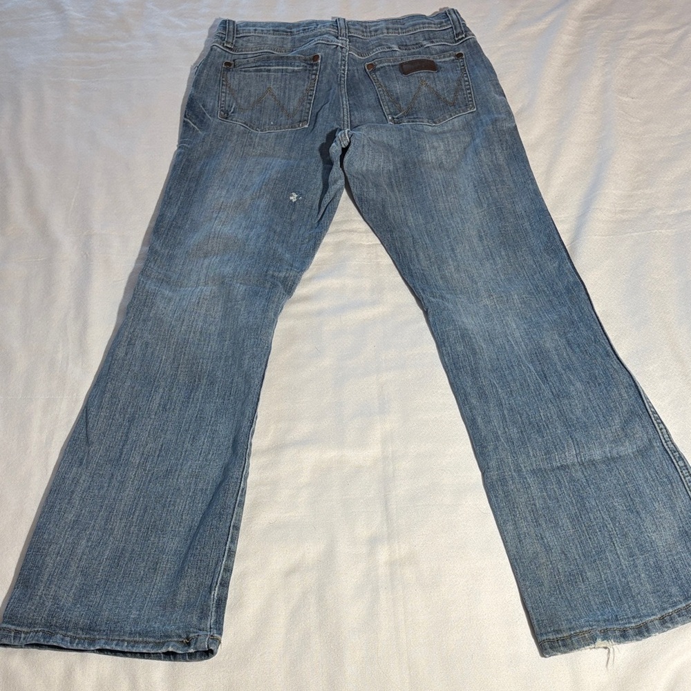 Wrangler Retro Slim Boot Cut Light Blue Slightly Distressed Denim Jeans